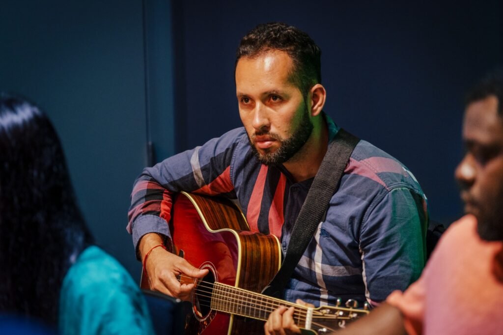 Guitar playing at the Dovetail Orchestra